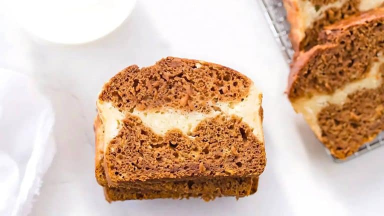 Slices of marbled bread with a light and dark brown pattern on a white background.