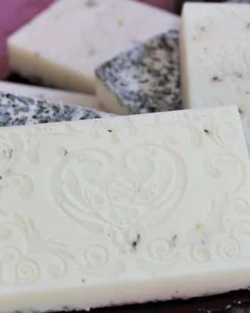 Goat milk soaps for sinus relief - homemade bar soaps with essential oils in background