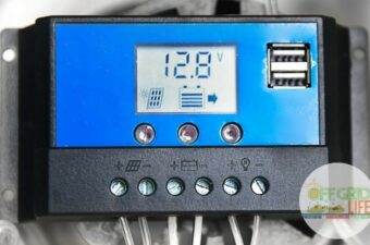 Charge controller on a wall showing voltage