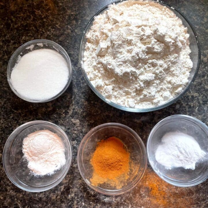 A bowl of flour, sugar, cinnamon, and other ingredients for my mason jar pancake recipe.