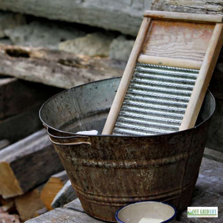 a picture of a washboard in a steel basin outdoors