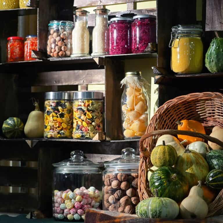 Pantry shelves with mason jars and baskets.
