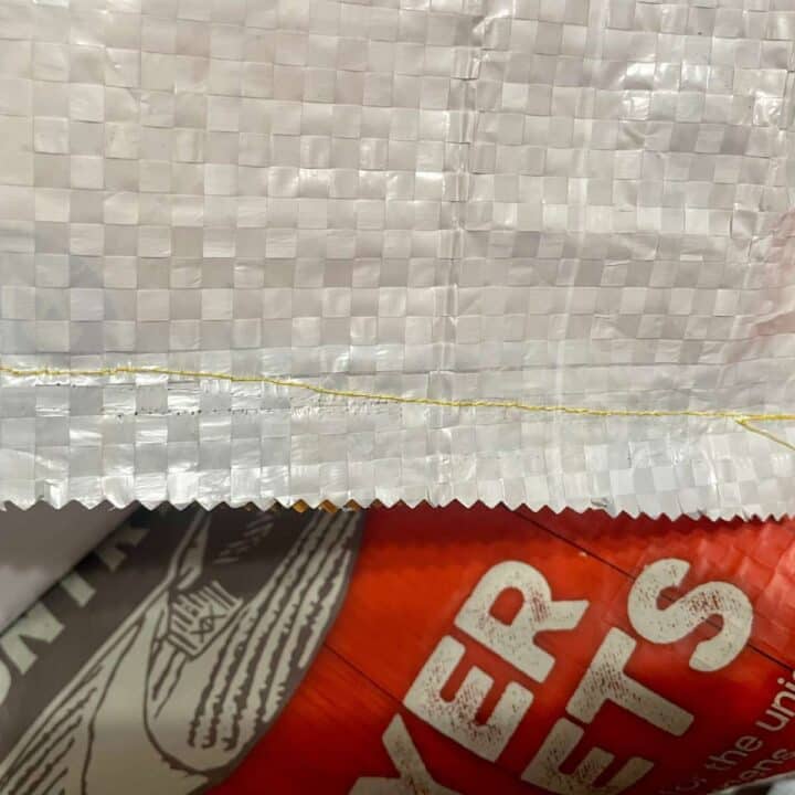 A plastic bag with a plastic bag on top of it.