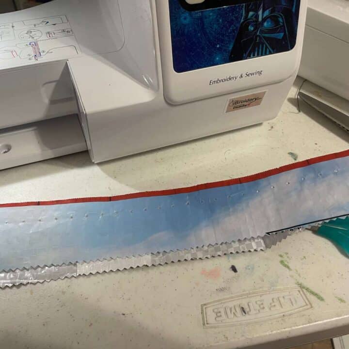 A sewing machine with a piece of fabric on it.