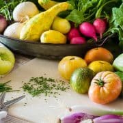 Fresh winter seasonal vegetables on a cutting board.