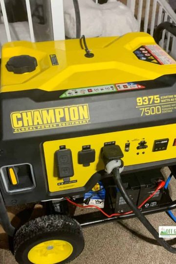 Generator for home use sitting outdoors.