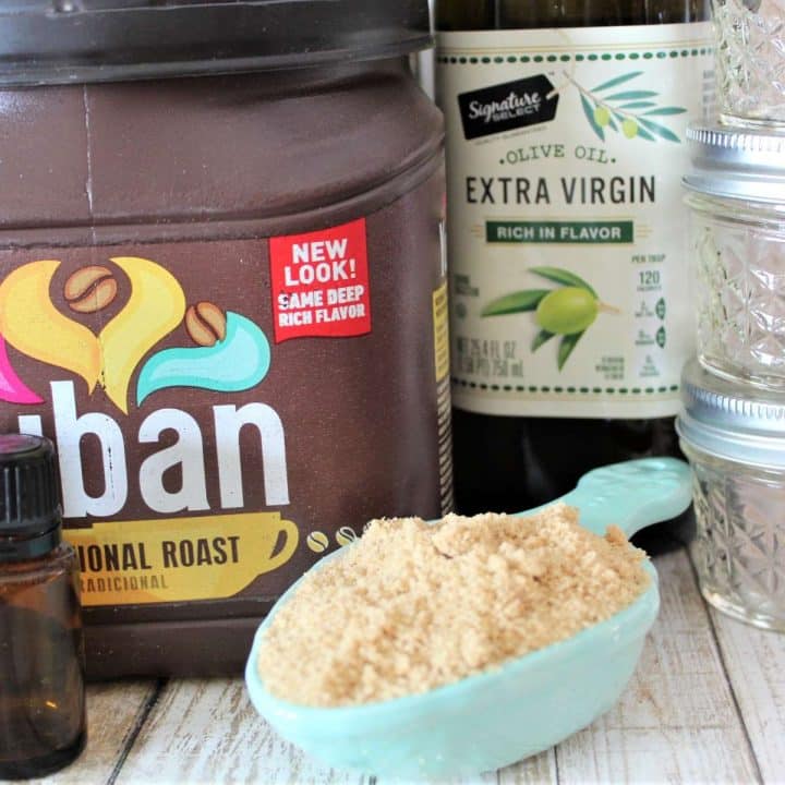 The ingredients for a homemade coffee sugar scrub are on a table.