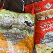 A bag of chicken feed and a bag of chicken feed.