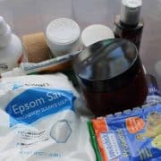 A plastic container with a variety of items in it.