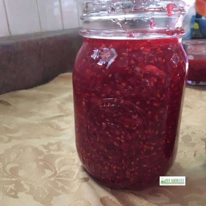 homemade raspberry jam in glass jar