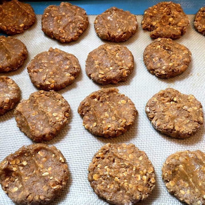 Goat treat cookies on a baking sheet.